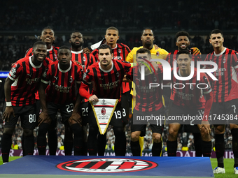 Milan line up (L-R) Rafael Leao, Youssouf Fofana, Malick Thiaw,  Mike Maignan, Emerson Royal, Alvaro Morata, Yunus Musah, Fikayo Tomori, The...