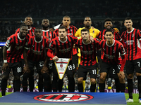 Milan line up (L-R) Rafael Leao, Youssouf Fofana, Malick Thiaw,  Mike Maignan, Emerson Royal, Alvaro Morata, Yunus Musah, Fikayo Tomori, The...