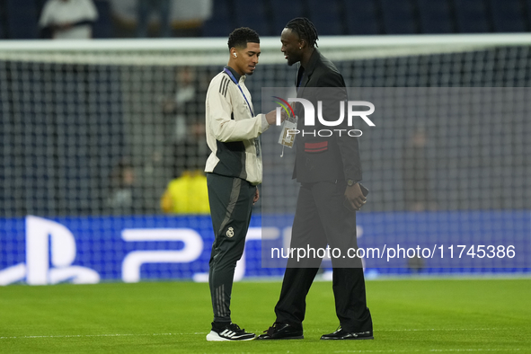 Jude Bellingham central midfield of Real Madrid and England and Tammy Abraham centre-forward of AC Milan and England talks prior the UEFA Ch...