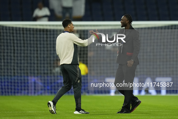 Jude Bellingham central midfield of Real Madrid and England and Tammy Abraham centre-forward of AC Milan and England talks prior the UEFA Ch...