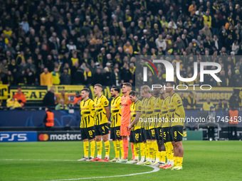 Players of Borussia Dortmund stand for a minute of silence for the flood victims in Valencia prior to the UEFA Champions League 2024/25 Leag...