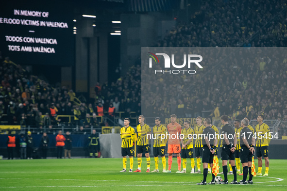 Players of Borussia Dortmund stand for a minute of silence for the flood victims in Valencia prior to the UEFA Champions League 2024/25 Leag...