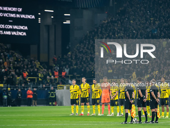 Players of Borussia Dortmund stand for a minute of silence for the flood victims in Valencia prior to the UEFA Champions League 2024/25 Leag...