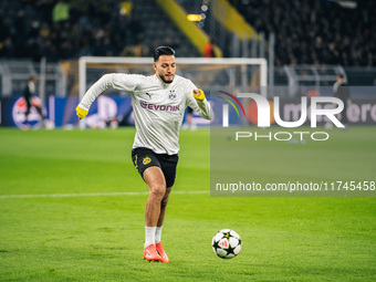 Ramy Bensebaini of Borussia Dortmund warms up before the UEFA Champions League 2024/25 League Phase MD4 soccer match between Borussia Dortmu...