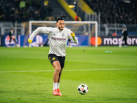 Ramy Bensebaini of Borussia Dortmund warms up before the UEFA Champions League 2024/25 League Phase MD4 soccer match between Borussia Dortmu...