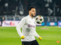 Ramy Bensebaini of Borussia Dortmund warms up before the UEFA Champions League 2024/25 League Phase MD4 soccer match between Borussia Dortmu...