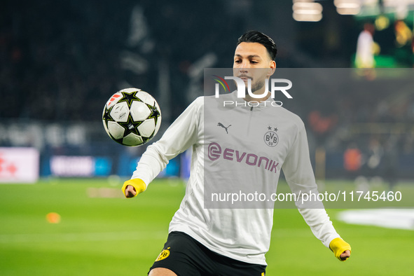 Ramy Bensebaini of Borussia Dortmund warms up before the UEFA Champions League 2024/25 League Phase MD4 soccer match between Borussia Dortmu...