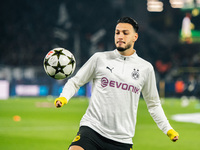 Ramy Bensebaini of Borussia Dortmund warms up before the UEFA Champions League 2024/25 League Phase MD4 soccer match between Borussia Dortmu...