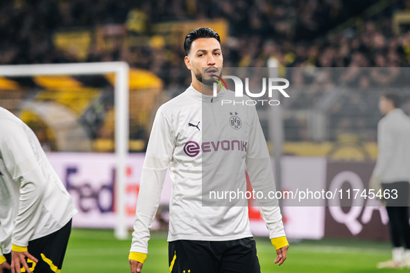 Ramy Bensebaini of Borussia Dortmund looks on before the UEFA Champions League 2024/25 League Phase MD4 soccer match between Borussia Dortmu...