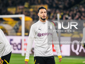 Ramy Bensebaini of Borussia Dortmund looks on before the UEFA Champions League 2024/25 League Phase MD4 soccer match between Borussia Dortmu...