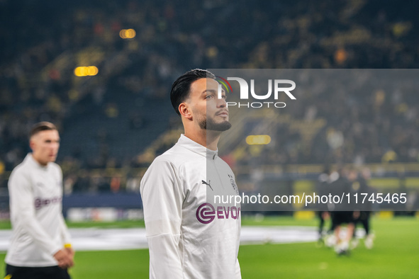 Ramy Bensebaini of Borussia Dortmund looks on before the UEFA Champions League 2024/25 League Phase MD4 soccer match between Borussia Dortmu...