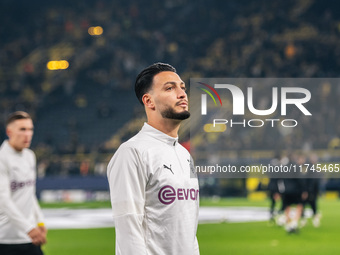 Ramy Bensebaini of Borussia Dortmund looks on before the UEFA Champions League 2024/25 League Phase MD4 soccer match between Borussia Dortmu...