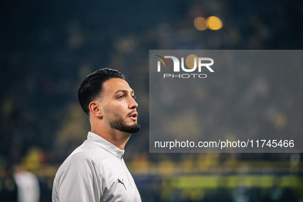 Ramy Bensebaini of Borussia Dortmund looks on before the UEFA Champions League 2024/25 League Phase MD4 soccer match between Borussia Dortmu...