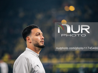 Ramy Bensebaini of Borussia Dortmund looks on before the UEFA Champions League 2024/25 League Phase MD4 soccer match between Borussia Dortmu...