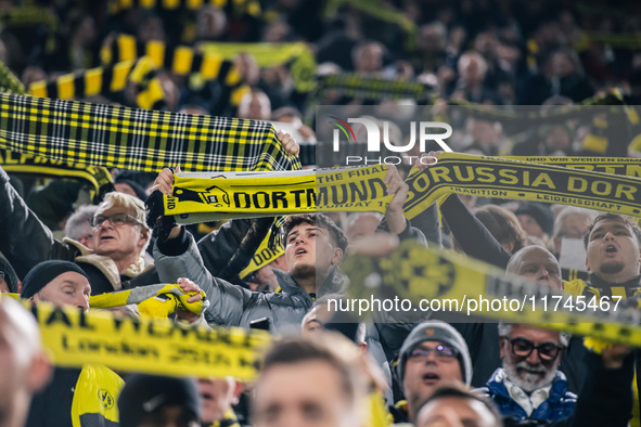 Fans of Borussia Dortmund cheer for their team prior to the UEFA Champions League 2024/25 League Phase MD4 soccer match between Borussia Dor...