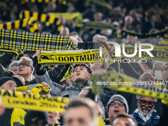 Fans of Borussia Dortmund cheer for their team prior to the UEFA Champions League 2024/25 League Phase MD4 soccer match between Borussia Dor...