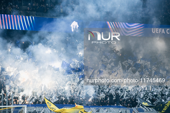 Fans light pyros before the UEFA Champions League 2024/25 League Phase MD4 soccer match between Borussia Dortmund and SK Sturm Graz at BVB S...