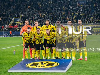 Players of Borussia Dortmund pose for a team photo before the UEFA Champions League 2024/25 League Phase MD4 soccer match between Borussia D...