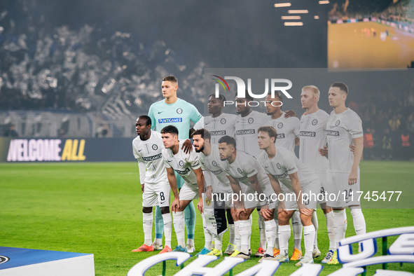 Players of SK Sturm Graz pose for a team photo before the UEFA Champions League 2024/25 League Phase MD4 soccer match between Borussia Dortm...