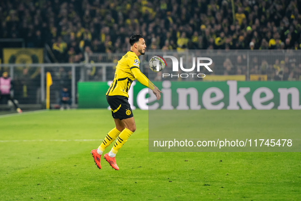 Ramy Bensebaini of Borussia Dortmund plays during the UEFA Champions League 2024/25 League Phase MD4 soccer match between Borussia Dortmund...