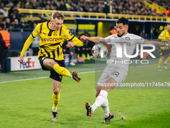 Maximilian Beier of Borussia Dortmund and Jusuf Gazibegovic of SK Sturm Graz are in action during the UEFA Champions League 2024/25 League P...