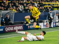 Maximilian Beier of Borussia Dortmund and Jusuf Gazibegovic of SK Sturm Graz are in action during the UEFA Champions League 2024/25 League P...