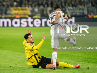 Ramy Bensebaini of Borussia Dortmund and Jusuf Gazibegovic of SK Sturm Graz are in action during the UEFA Champions League 2024/25 League Ph...