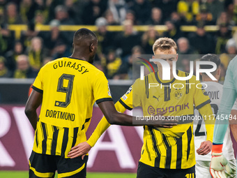 Serhou Guirassy and Maximilian Beier of Borussia Dortmund appear during the UEFA Champions League 2024/25 League Phase MD4 soccer match betw...