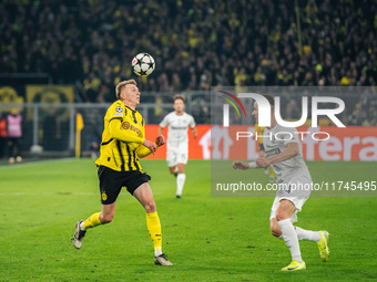 Maximilian Beier of Borussia Dortmund and Dimitri Lavalee of SK Sturm Graz are in action during the UEFA Champions League 2024/25 League Pha...