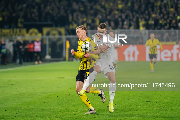 Maximilian Beier of Borussia Dortmund and Dimitri Lavalee of SK Sturm Graz are in action during the UEFA Champions League 2024/25 League Pha...