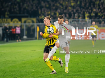 Maximilian Beier of Borussia Dortmund and Dimitri Lavalee of SK Sturm Graz are in action during the UEFA Champions League 2024/25 League Pha...