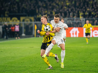 Maximilian Beier of Borussia Dortmund and Dimitri Lavalee of SK Sturm Graz are in action during the UEFA Champions League 2024/25 League Pha...