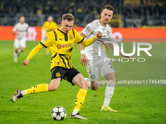 Maximilian Beier of Borussia Dortmund and Dimitri Lavalee of SK Sturm Graz are in action during the UEFA Champions League 2024/25 League Pha...