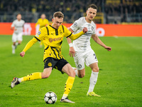 Maximilian Beier of Borussia Dortmund and Dimitri Lavalee of SK Sturm Graz are in action during the UEFA Champions League 2024/25 League Pha...