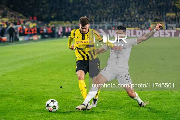 Pascal Gross of Borussia Dortmund and Jusuf Gazibegovic of SK Sturm Graz play during the UEFA Champions League 2024/25 League Phase MD4 socc...