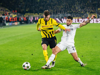 Pascal Gross of Borussia Dortmund and Jusuf Gazibegovic of SK Sturm Graz play during the UEFA Champions League 2024/25 League Phase MD4 socc...