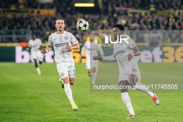 Tochi Chukwuani plays during the UEFA Champions League 2024/25 League Phase MD4 soccer match between Borussia Dortmund and SK Sturm Graz at...