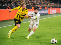 Julian Brandt of Borussia Dortmund and Otar Kiteishvili of SK Sturm Graz are in action during the UEFA Champions League 2024/25 League Phase...