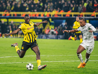 Serhou Guirassy of Borussia Dortmund and Emanuel Aiwu of SK Sturm Graz are in action during the UEFA Champions League 2024/25 League Phase M...