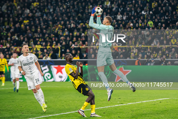 Serhou Guirassy of Borussia Dortmund and Kjell Scherpen of SK Sturm Graz are in action during the UEFA Champions League 2024/25 League Phase...