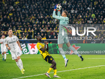 Serhou Guirassy of Borussia Dortmund and Kjell Scherpen of SK Sturm Graz are in action during the UEFA Champions League 2024/25 League Phase...