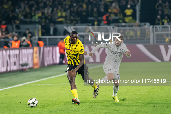 Serhou Guirassy of Borussia Dortmund and Otar Kiteishvili of SK Sturm Graz participate in the UEFA Champions League 2024/25 League Phase MD4...