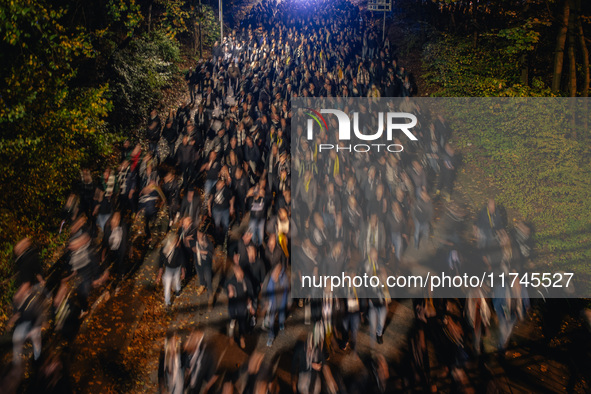 Fans of SK Sturm Graz march to the stadium before the UEFA Champions League 2024/25 League Phase MD4 soccer match between Borussia Dortmund...