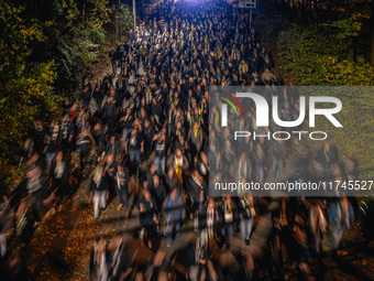 Fans of SK Sturm Graz march to the stadium before the UEFA Champions League 2024/25 League Phase MD4 soccer match between Borussia Dortmund...