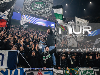 Fans of SK Sturm Graz cheer for their team during the UEFA Champions League 2024/25 League Phase MD4 soccer match between Borussia Dortmund...