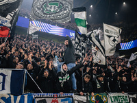 Fans of SK Sturm Graz cheer for their team during the UEFA Champions League 2024/25 League Phase MD4 soccer match between Borussia Dortmund...