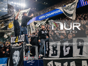 Fans of SK Sturm Graz cheer for their team during the UEFA Champions League 2024/25 League Phase MD4 soccer match between Borussia Dortmund...