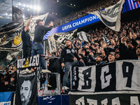 Fans of SK Sturm Graz cheer for their team during the UEFA Champions League 2024/25 League Phase MD4 soccer match between Borussia Dortmund...