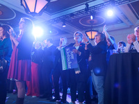 Attendees cheer while Minnesota Lieutenant Governor Peggy Flanagan speaks at the Minnesota DFL Election Night event at the InterContinental...