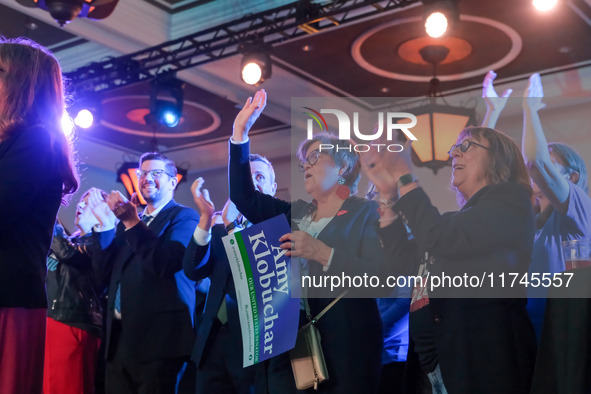 Attendees cheer while Minnesota Lieutenant Governor Peggy Flanagan speaks at the Minnesota DFL Election Night event at the InterContinental...